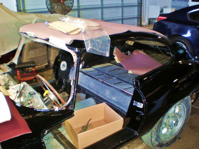 This Jag is being redone in the original factory light-blue interior (you can see it there on the rear seat/shelf) and will look gorgeous when finished.